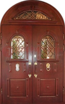 Стальная арочная дверь со стеклом и ковкой ДА-30 в дом из кирпича в Кашире